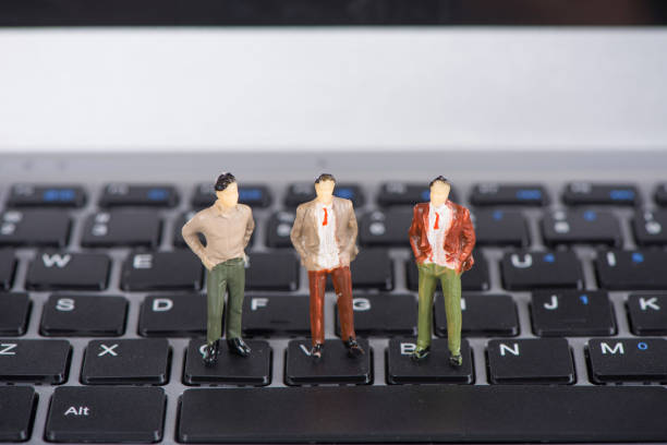 istock miniature businessman tactics challenge 1318066229