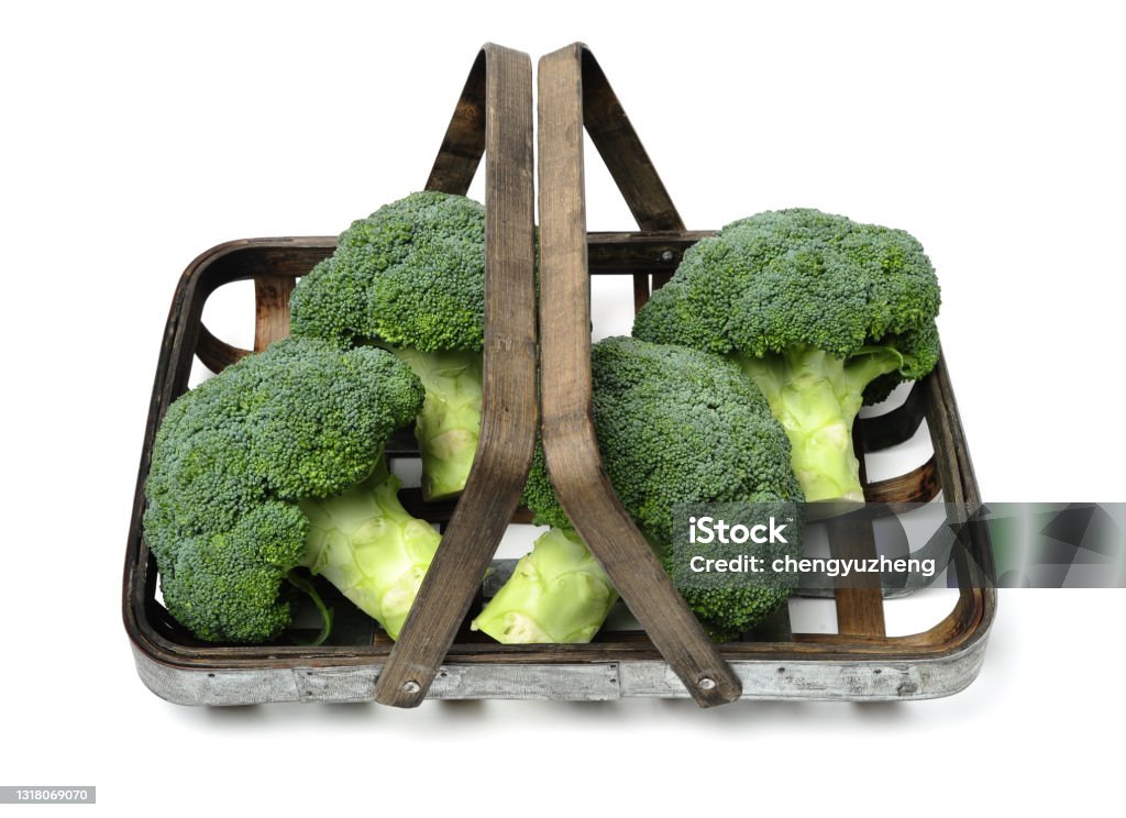 Broccoli vegetable Broccoli vegetable on white background Basket Stock Photo