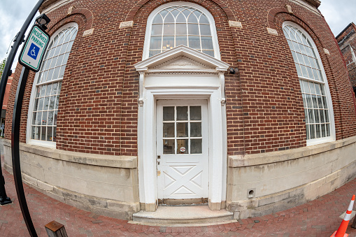 Greer, S.C. - April 23, 2021: Fisheye view of interesting architecture in the historic old town district of Greer. Brick building storefront.