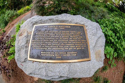 Spartanburg, S.C. - April 23, 2021:  Placard explaining the historical significance of the famous Hatcher Gardens, a beloved downtown landmark garden.