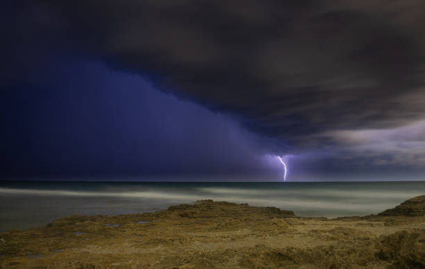 Lightning storm om Mediterranean Sea stock photo