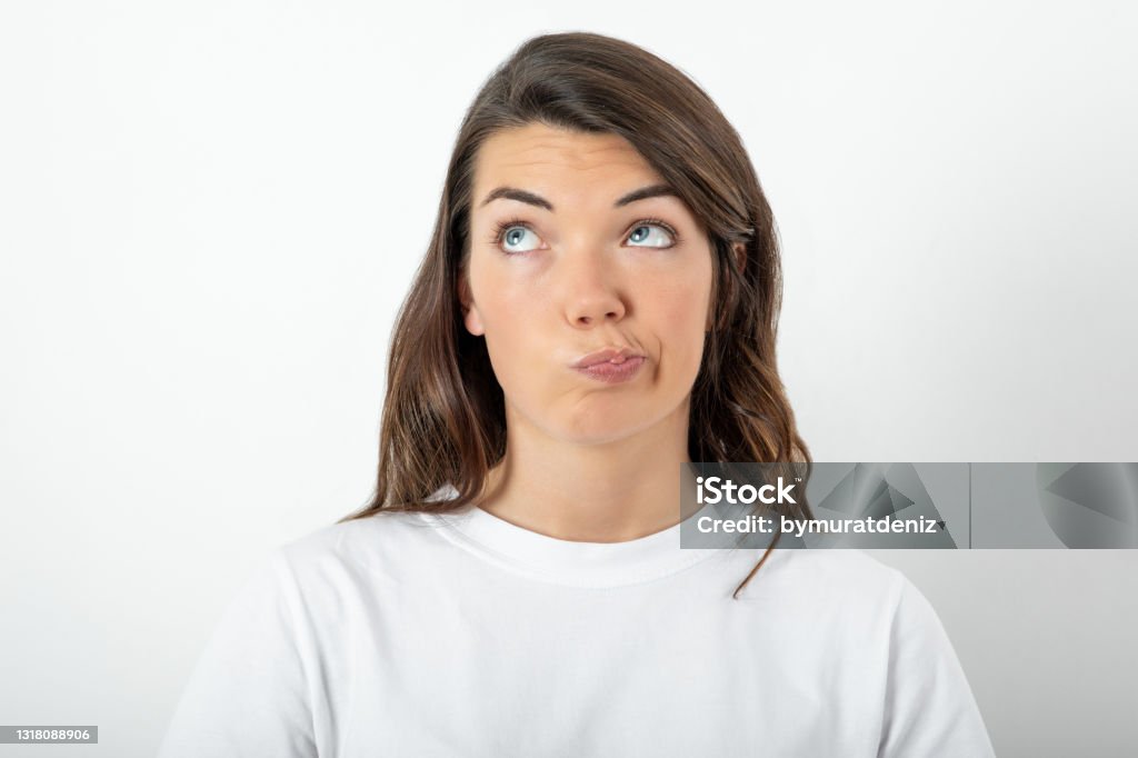 Young woman looking up Women Stock Photo