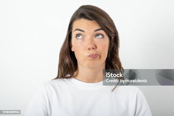 Young Woman Looking Up Stock Photo - Download Image Now - Women, Confusion, Cut Out