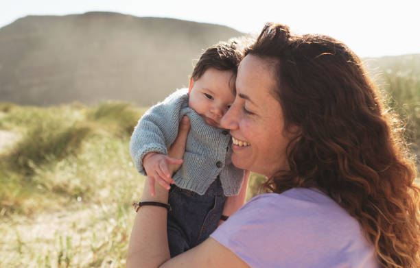 istock mother and baby hugging 1318094796