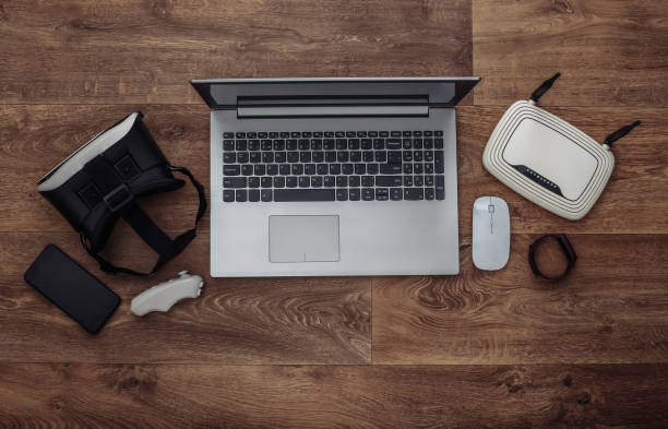 istock Modern youth gadgets and devices on wooden background. Top view. Flat lay 1318095908
