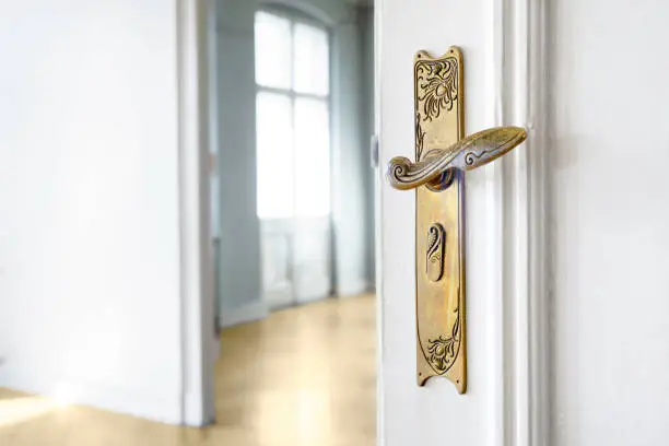 Brass door handle in a classic Berlin "Altbau" apartment.
