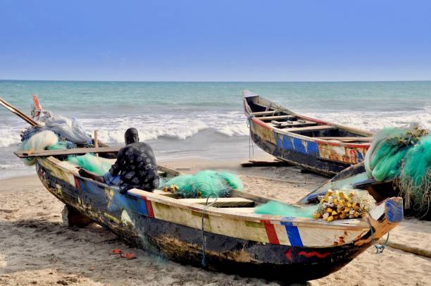 istock A Fisherman Sits In His Boat 1318102972