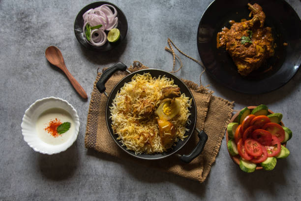 istock Mughlai cuisine dum biryani or rice cooked with Indian spices and meat. 1318105871