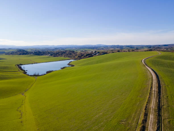 istock Road across peaceful landscape 1318111083