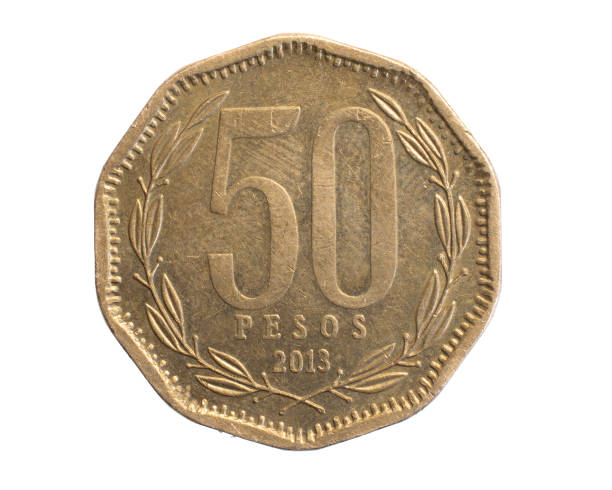 istock Chile fifty pesos coin on a white isolated background 1318113421