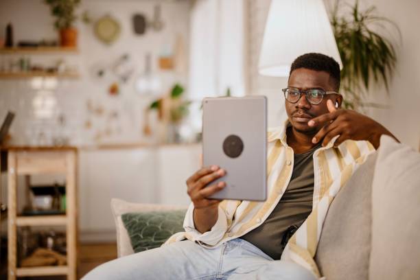 istock Young man having online mental health session 1318114351