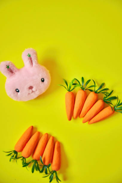 istock Easter white bunny on yellow background. Happy Easter. Holiday concept. 1318117644