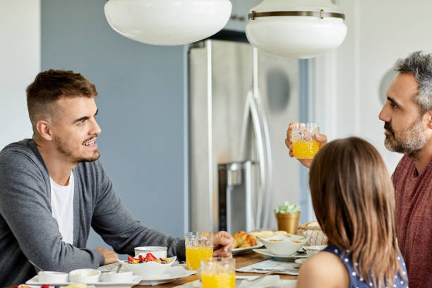 istock Family having breakfast at home 1318117960