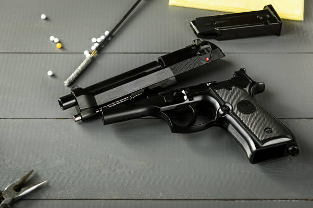 istock Cleaning the gun - replicas for airsoft games 1318121226