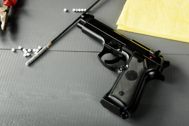 istock Cleaning the gun - replicas for airsoft games 1318121234
