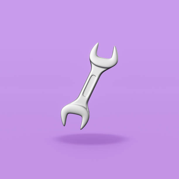 istock Metallic Wrench on Purple Background 1318128030