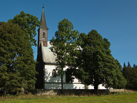 Church with twin steeples in evening light