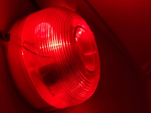 istock Red fire alarm system that operates automatically when there is a threat of fire or smoke in the room. 1318131403