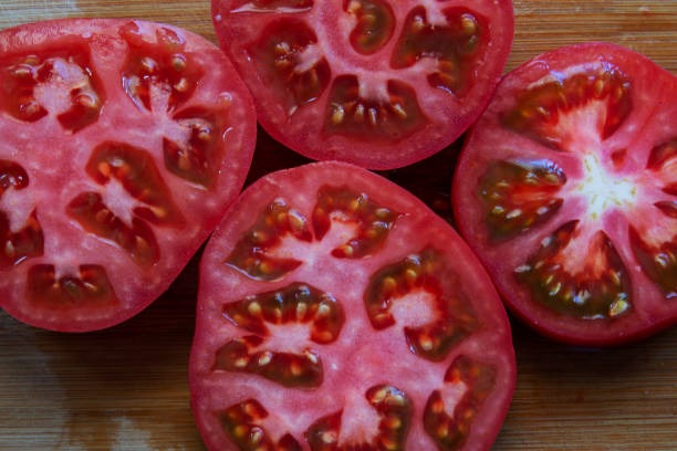 istock horizontally sliced ​​heirloom tomatoes. 1318132066