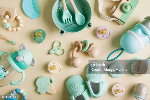 Baby Care Accessories And Bootees Stock Photo - Download Image Now - Pacifier, Bottle, No People