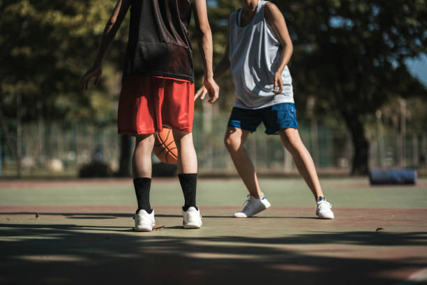 istock An Asian couple playing basketball 1318136312
