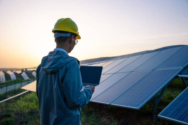 istock Engineer working with a laptop in solar power station 1318137489
