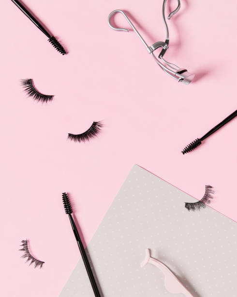 istock Creative layout with make up accessories on pastel pink background 1318140284