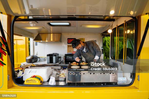 Mature Man Making Tacos In His Food Truck Stock Photo - Download Image Now - Food Truck, Taco, Chef