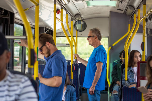 istock Senior man traveling in passenger bus 1318143085
