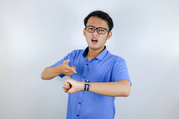 istock Being late to work and deadline, Young asian man is time delay and late on project. Executive angry, hurry, stress, frustrated and unsatisfied worker man lateness to office. 1318144844