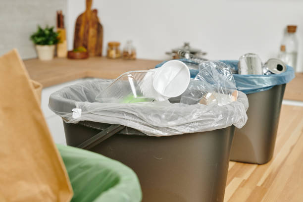 istock Trash bins with used disposable kitchenware and other waste 1318146207
