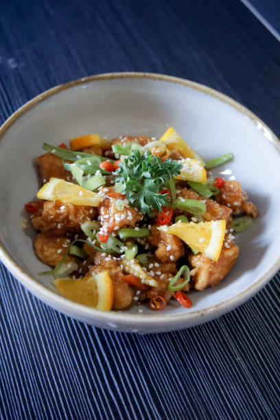 istock Homemade Chicken Orange Served in a White Bowl 1318147715