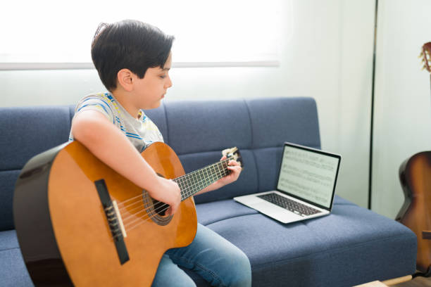 istock Creative student showing his music skills 1318148954