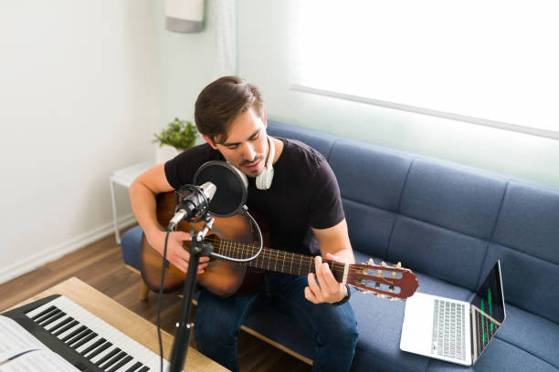 istock Musician feeling inspired while recording new music 1318149617