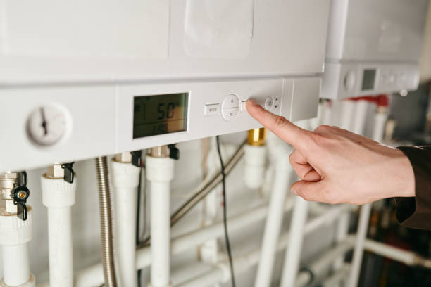 istock A hand of technician keeping forefinger on button of air conditioner 1318150150