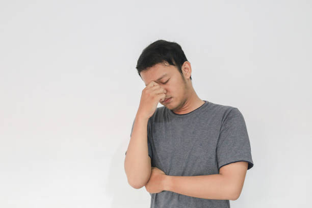 istock Young Asian man wear grey shirt with thinking and looking idea gesture 1318150178