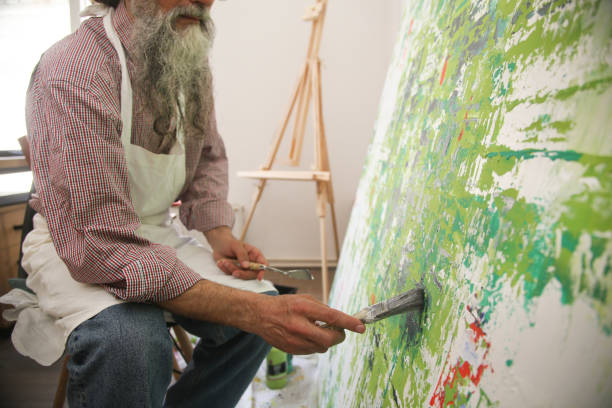 istock Senior male painter in his studio 1318150388