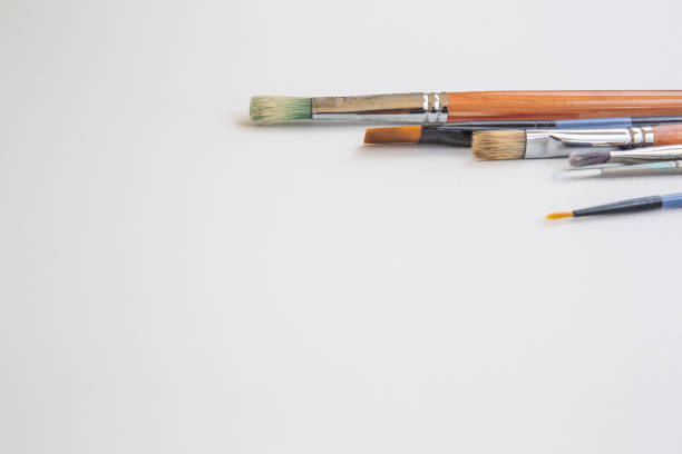 istock Paint brushes on white background with copy space, no people, horizontal layout 1318151239