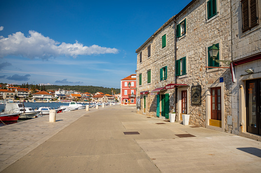 Stari Grad, Croatia - March 28, 2021: Embankment of Stari Grad town on the Hvar island without people in Croatia