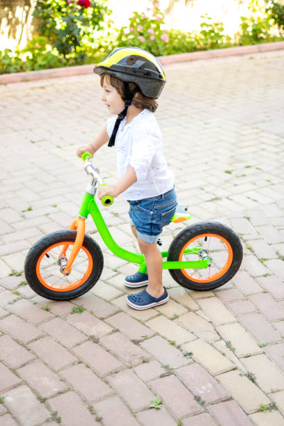 istock Cute boy riding bike 1318155938