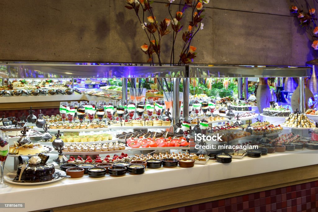 Dessert buffet detail from the luxury hotel restaurant full of delicious desserts. Buffet Stock Photo