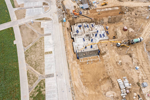 istock construction site view from above. working concrete mixer and concrete pumping machines. aerial photo 1318157559