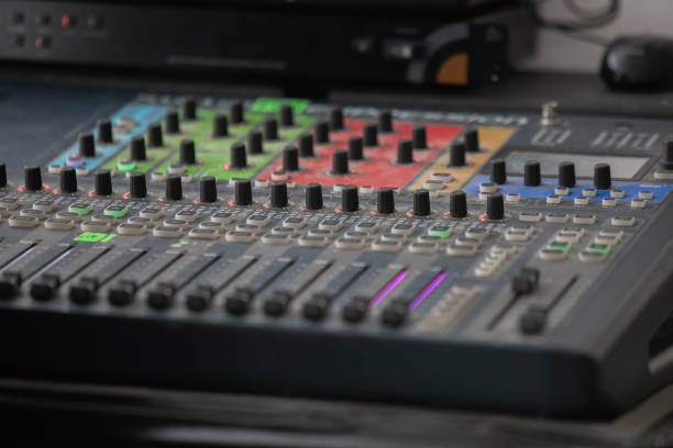 istock Closeup Analog sound mixer with selected focus. Professional audio mixing console broadcasting. 1318157917