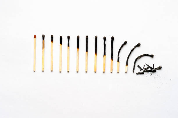 istock row of burned-out matches over the white background 1318159174