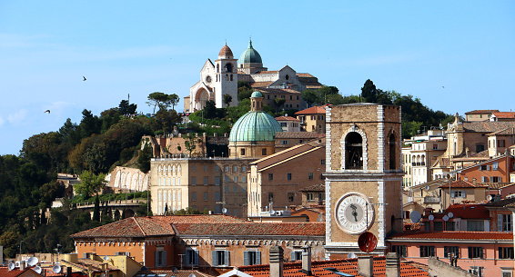 Photo of the city of Ancona with a view of its Cathedral. The Cathedral stands in a scenographic position at the top of the Guasco hill, already occupied by the Acropolis of the Greek-Doric city, from where it dominates the whole city of Ancona and its gulf.