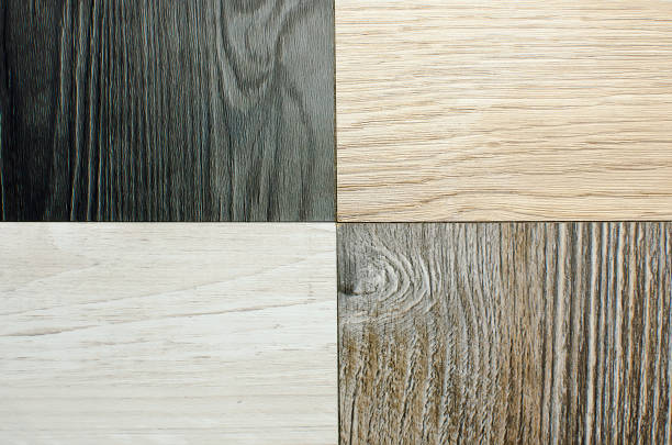 istock Laminate background. Samples of laminate or parquet with a pattern and wood texture for flooring and interior design. Production of wooden floors. 1318161021
