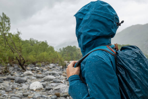 istock Hiker female under torrential rain 1318163675