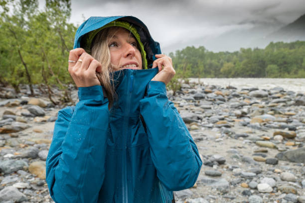 istock Hiker female under torrential rain 1318163677