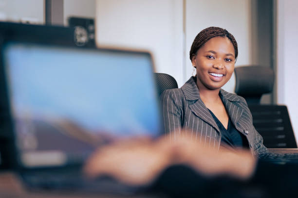 istock Successful young businesswoman at her workplace 1318168680