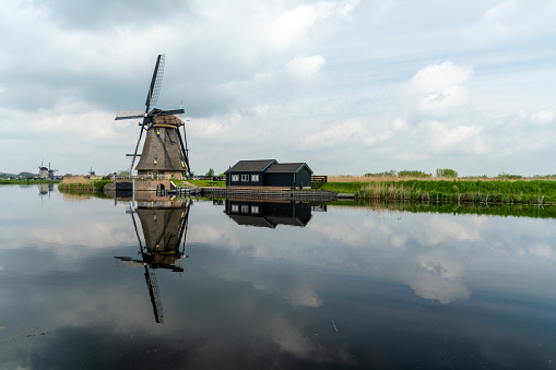 view of a historic 18-century windmill at Kinderdijk in South Holland